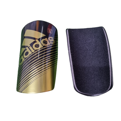 ESPINILLERAS ADIDAS NEGRO/DORADO