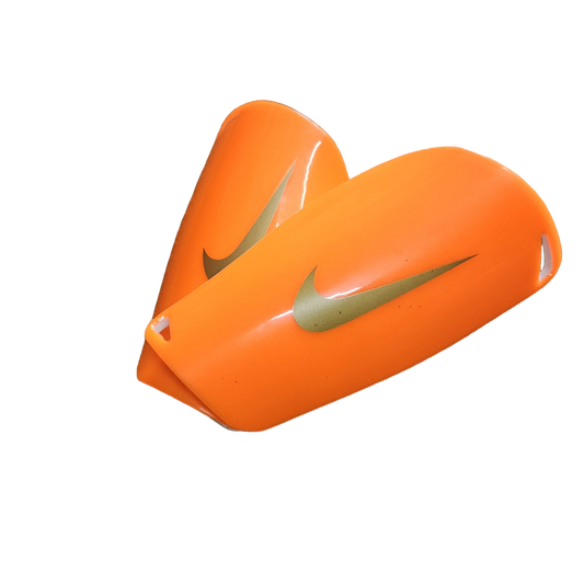 ESPINILLERAS NIKE NARANJAS NIÑO